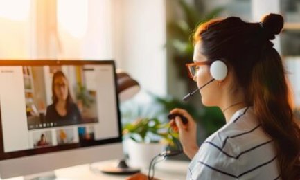 Support agent in a home office setting, attending a video call with a client, portraying remote work, adaptability, modern support